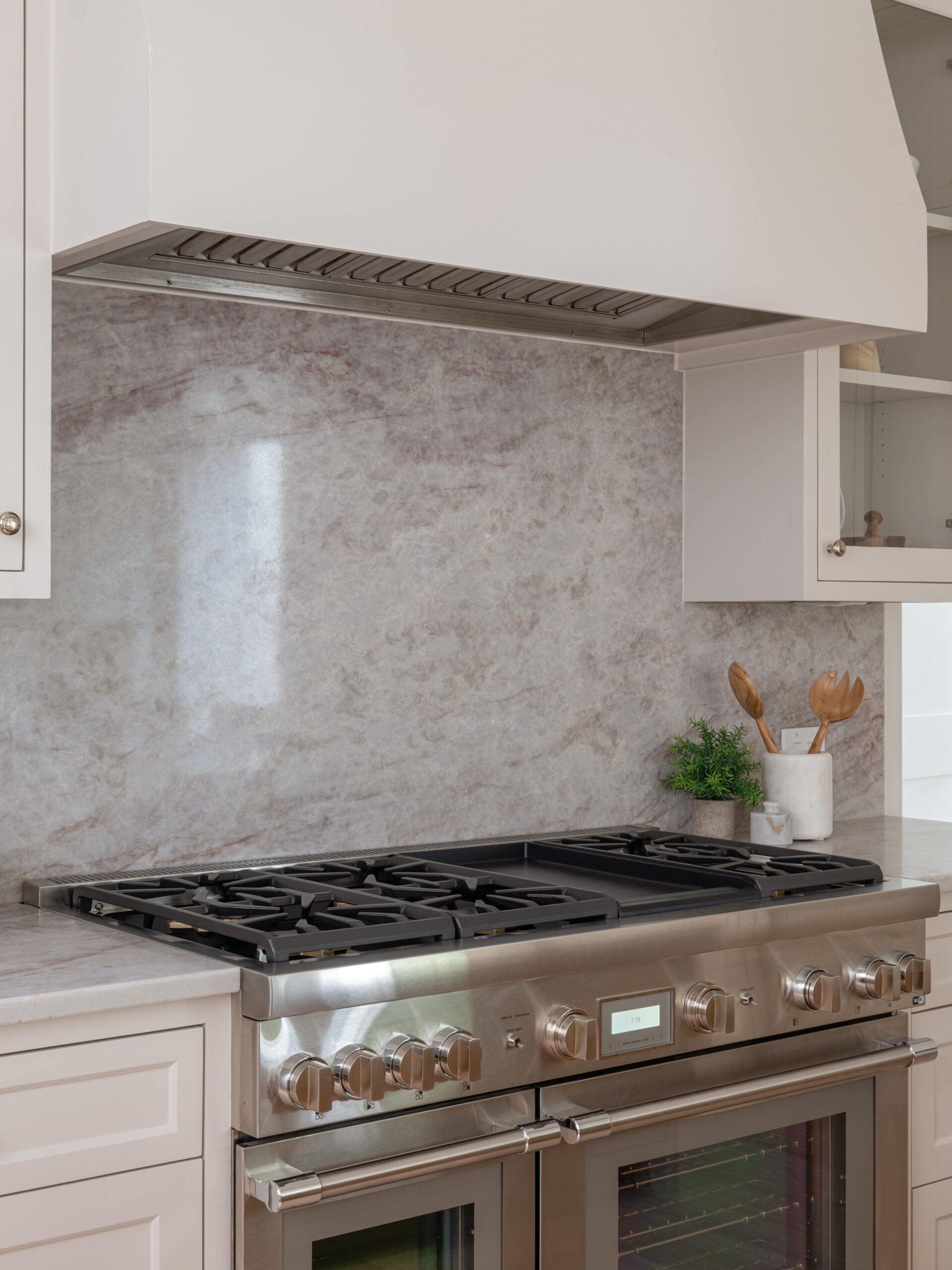 CLASSIC EUROPEAN REVIVAL – Chamberlain Arlington Heights, Lafayette Ave, Fort Worth, TX 76107-10 Professional gas range with stone slab backsplash in a European style kitchen — Blue Cypress Design Build
