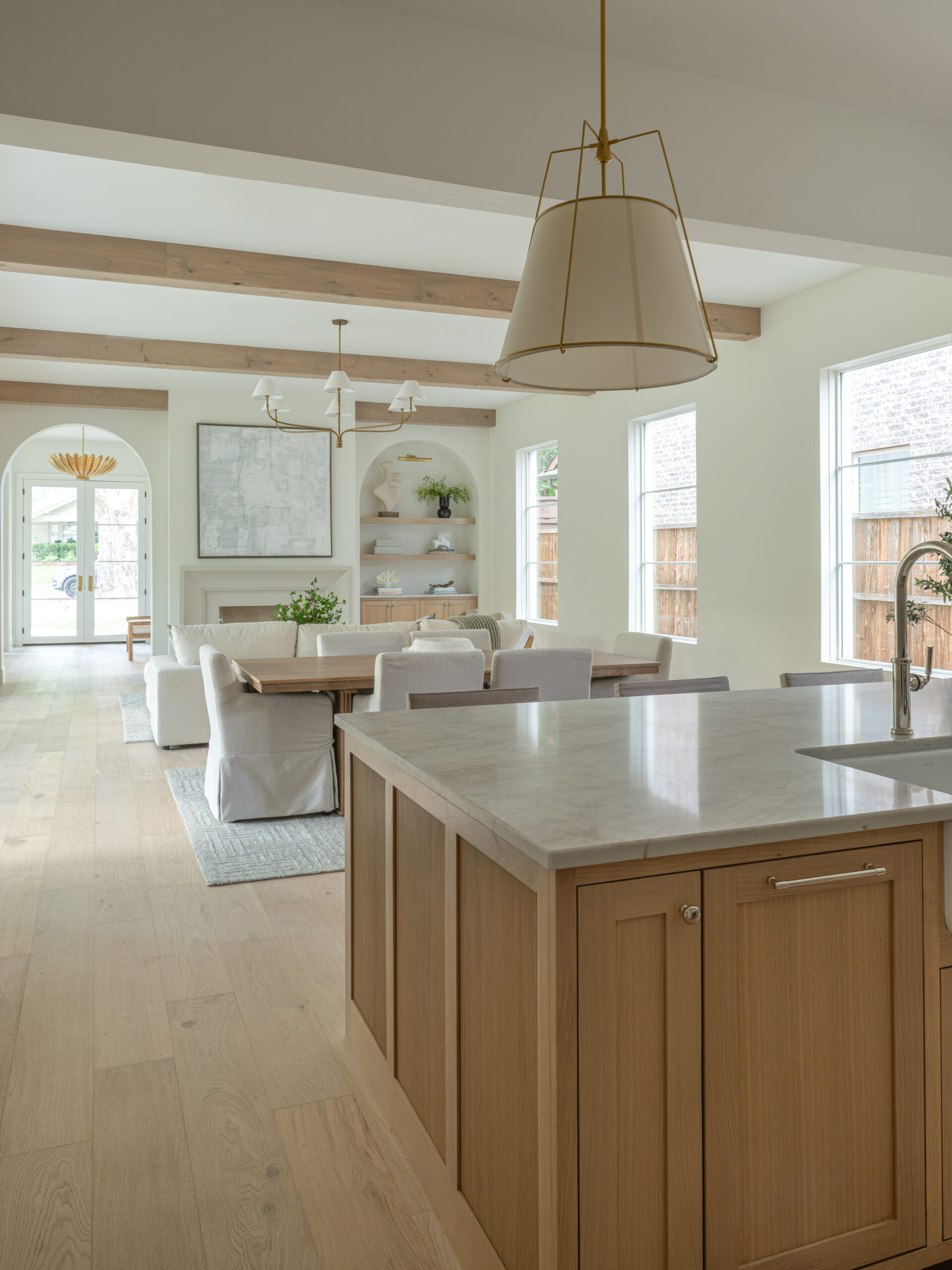 CLASSIC EUROPEAN REVIVAL – Chamberlain Arlington Heights, Lafayette Ave, Fort Worth, TX 76107-12 Kitchen island overlooking open dining and living room — luxury custom remodel by Blue Cypress Design Build