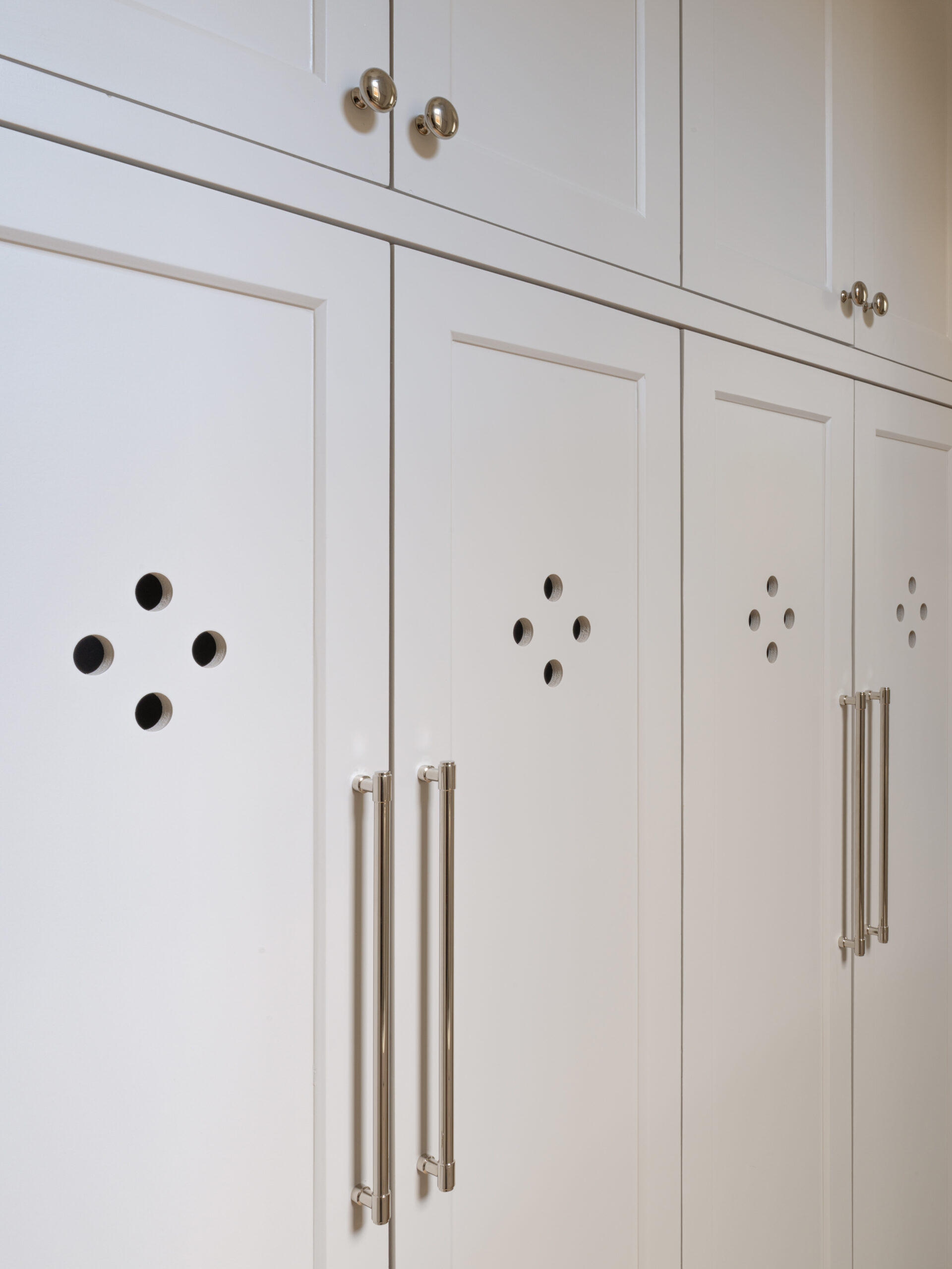 CLASSIC EUROPEAN REVIVAL – Chamberlain Arlington Heights, Lafayette Ave, Fort Worth, TX 76107-15 Cabinet detail with dot cutouts and polished nickel pulls — luxury custom home, Blue Cypress Design Build