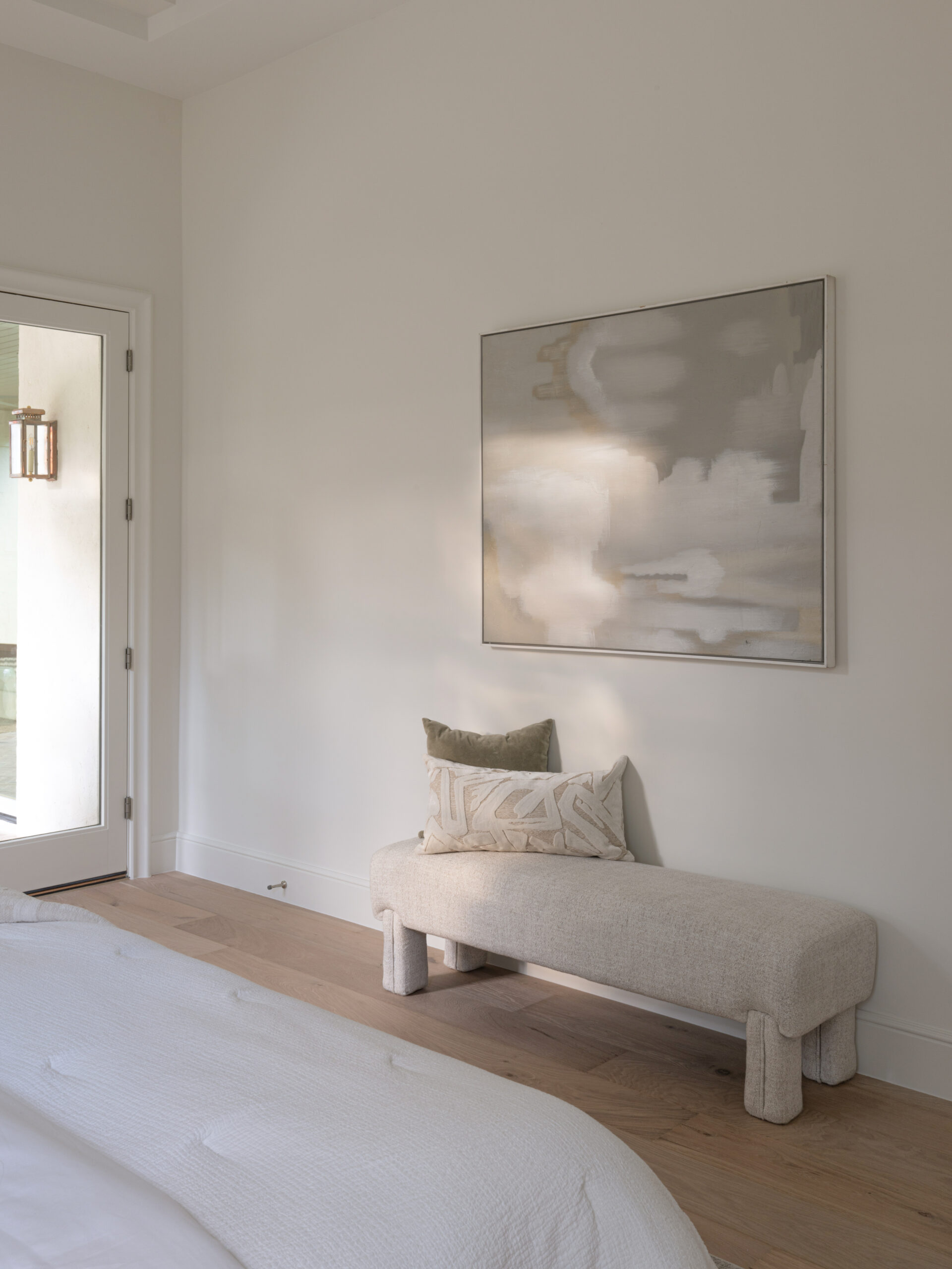 CLASSIC EUROPEAN REVIVAL – Chamberlain Arlington Heights, Lafayette Ave, Fort Worth, TX 76107-17 Primary bedroom sitting area with upholstered bench and abstract art — Blue Cypress Design Build, Fort Worth TX