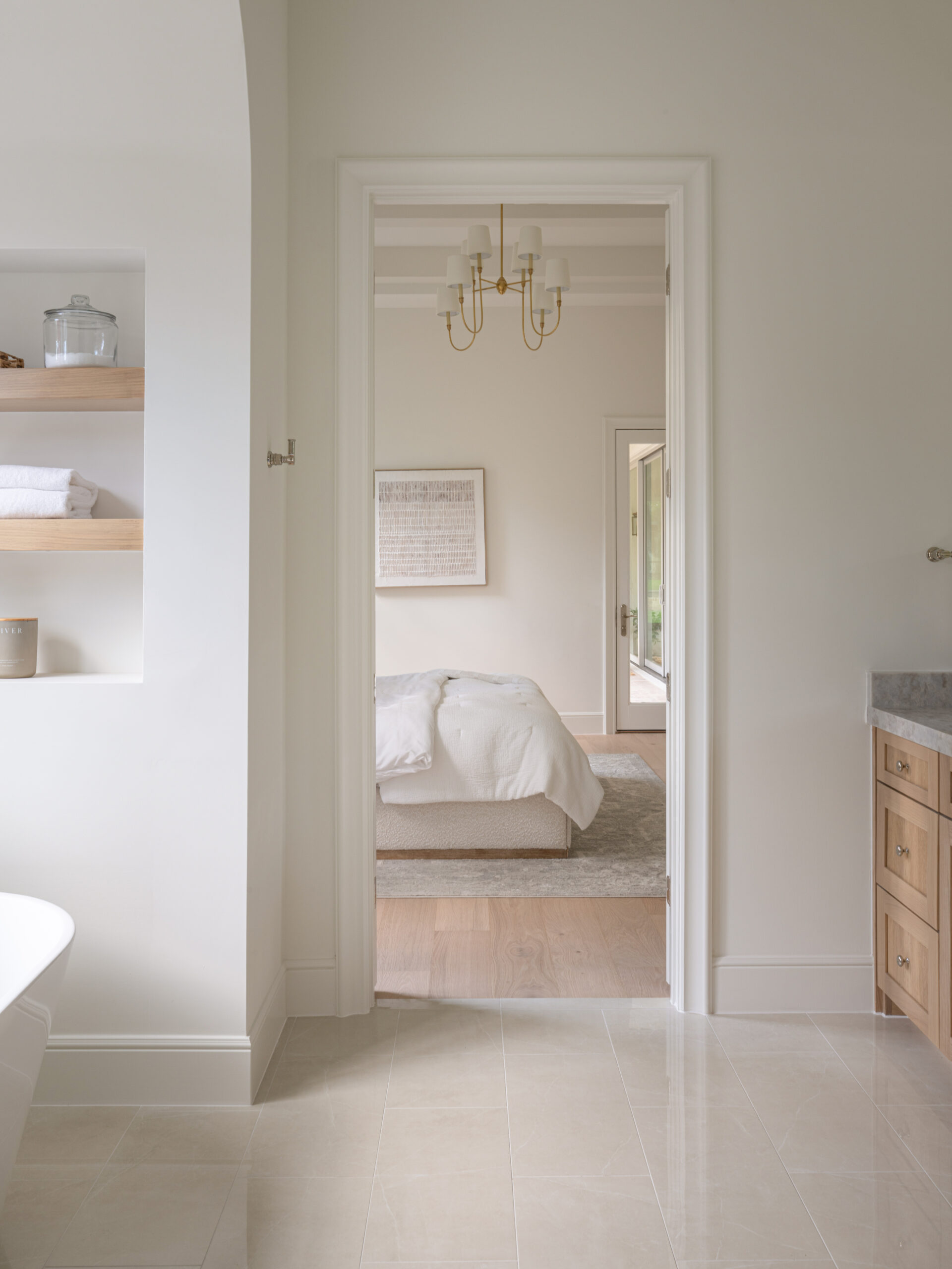 CLASSIC EUROPEAN REVIVAL – Chamberlain Arlington Heights, Lafayette Ave, Fort Worth, TX 76107-20 Primary bath opening to bedroom with oak vanity and marble tile floors — Blue Cypress Design Build, Fort Worth TX