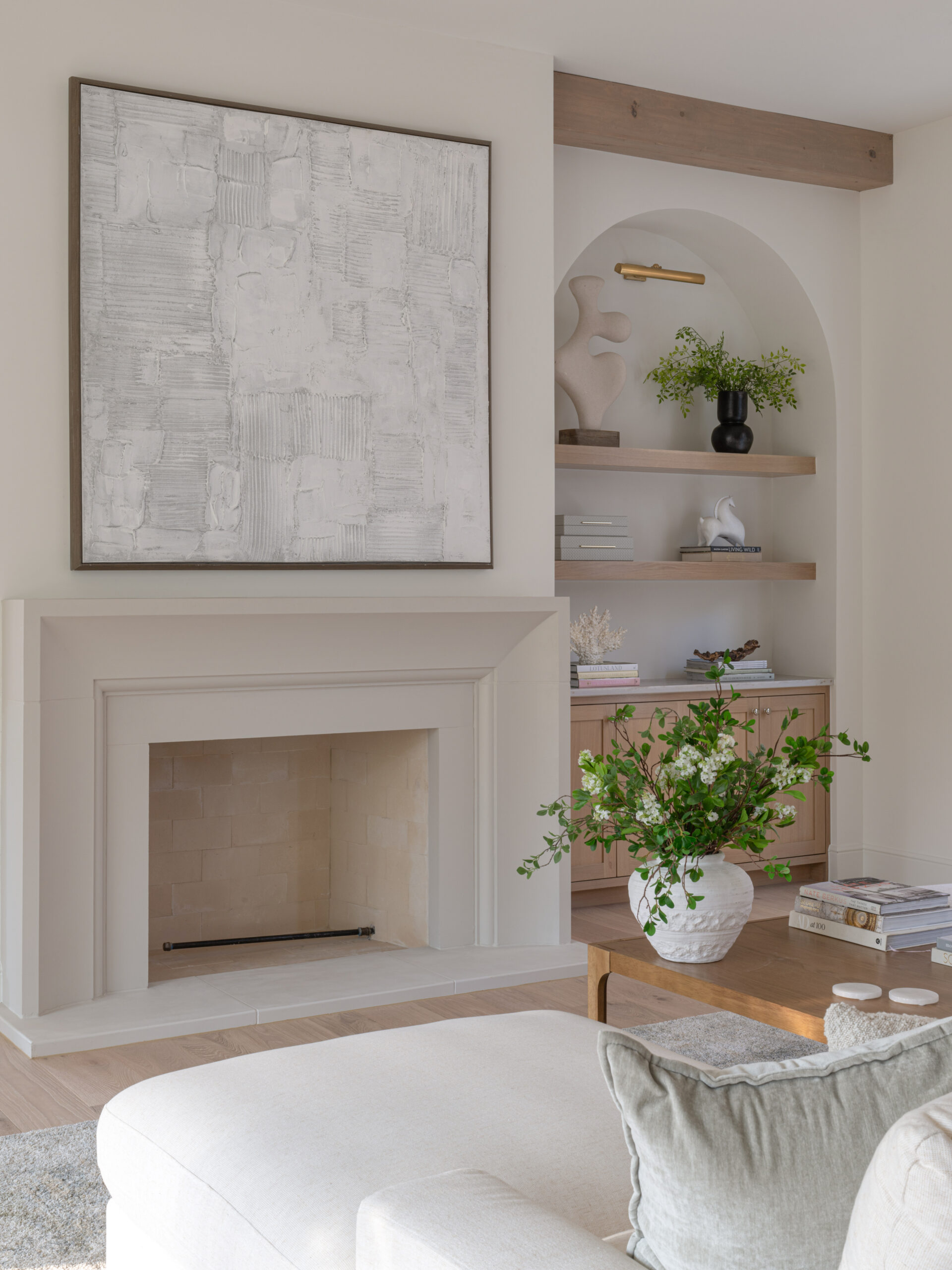CLASSIC EUROPEAN REVIVAL – Chamberlain Arlington Heights, Lafayette Ave, Fort Worth, TX 76107-25 Plaster fireplace beside arched built-in with oak shelving — Blue Cypress Design Build, Fort Worth TX