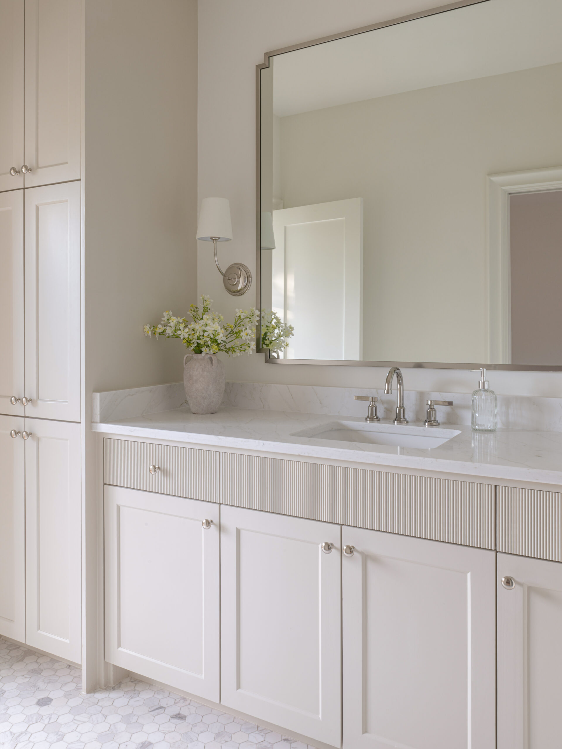 CLASSIC EUROPEAN REVIVAL – Chamberlain Arlington Heights, Lafayette Ave, Fort Worth, TX 76107-30 Vanity with reeded drawer fronts and marble hex tile floor — Blue Cypress Design Build, Fort Worth TX