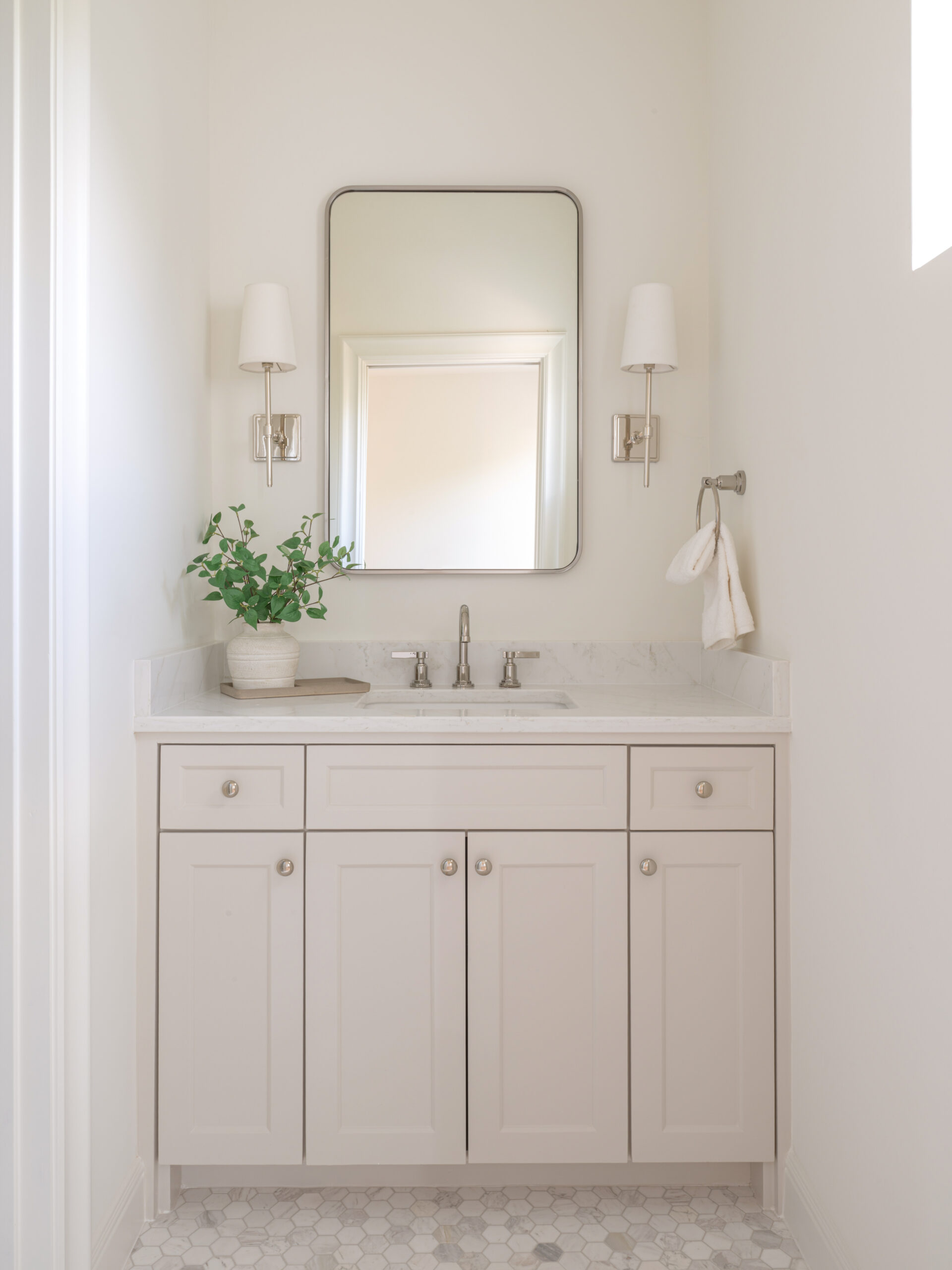 CLASSIC EUROPEAN REVIVAL – Chamberlain Arlington Heights, Lafayette Ave, Fort Worth, TX 76107-35 Vanity with twin sconces and marble hex floor in a luxury custom home — Blue Cypress Design Build