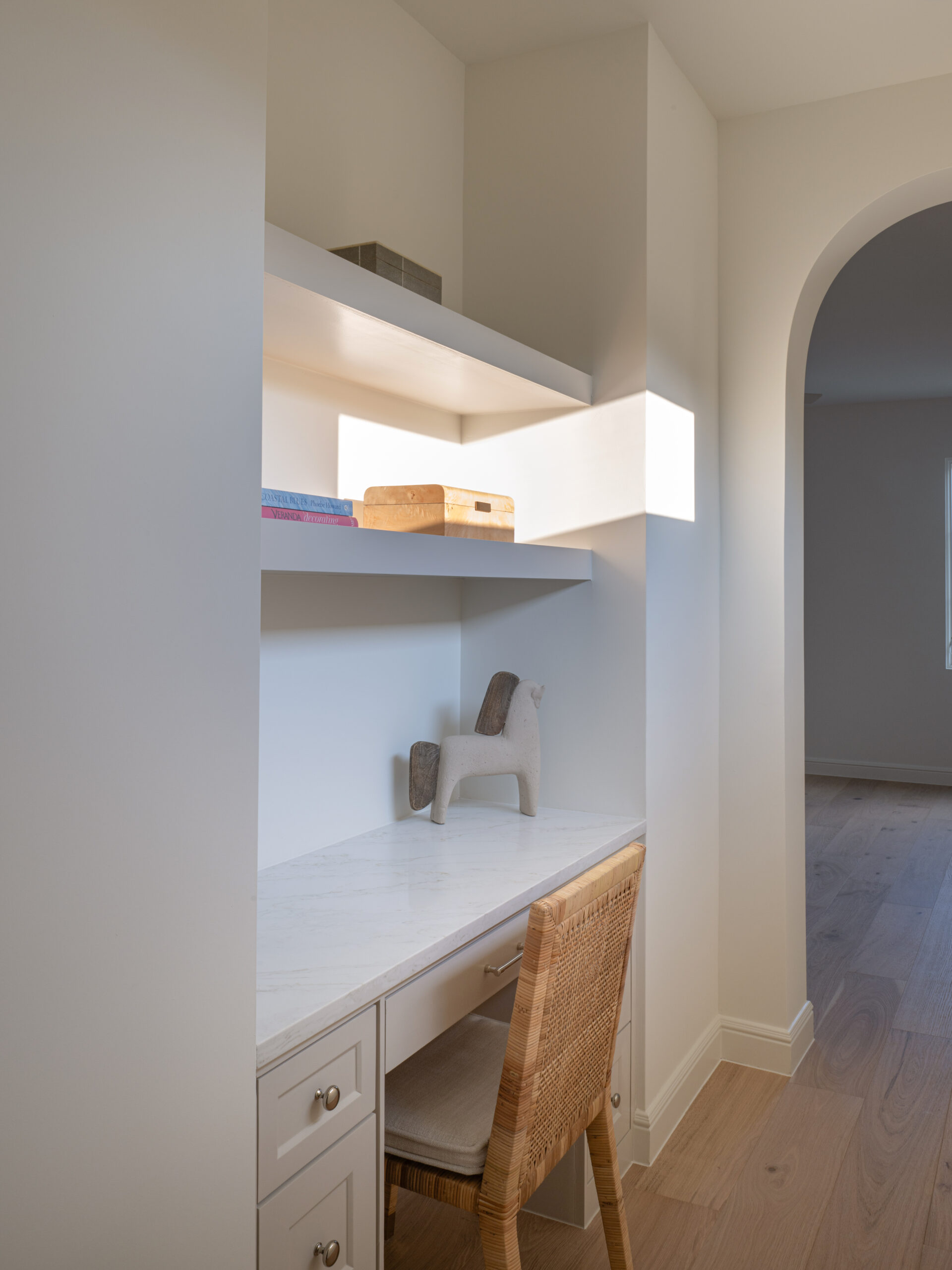 CLASSIC EUROPEAN REVIVAL – Chamberlain Arlington Heights, Lafayette Ave, Fort Worth, TX 76107-37 Built-in desk nook with floating shelves and rattan chair — Blue Cypress Design Build, Fort Worth TX