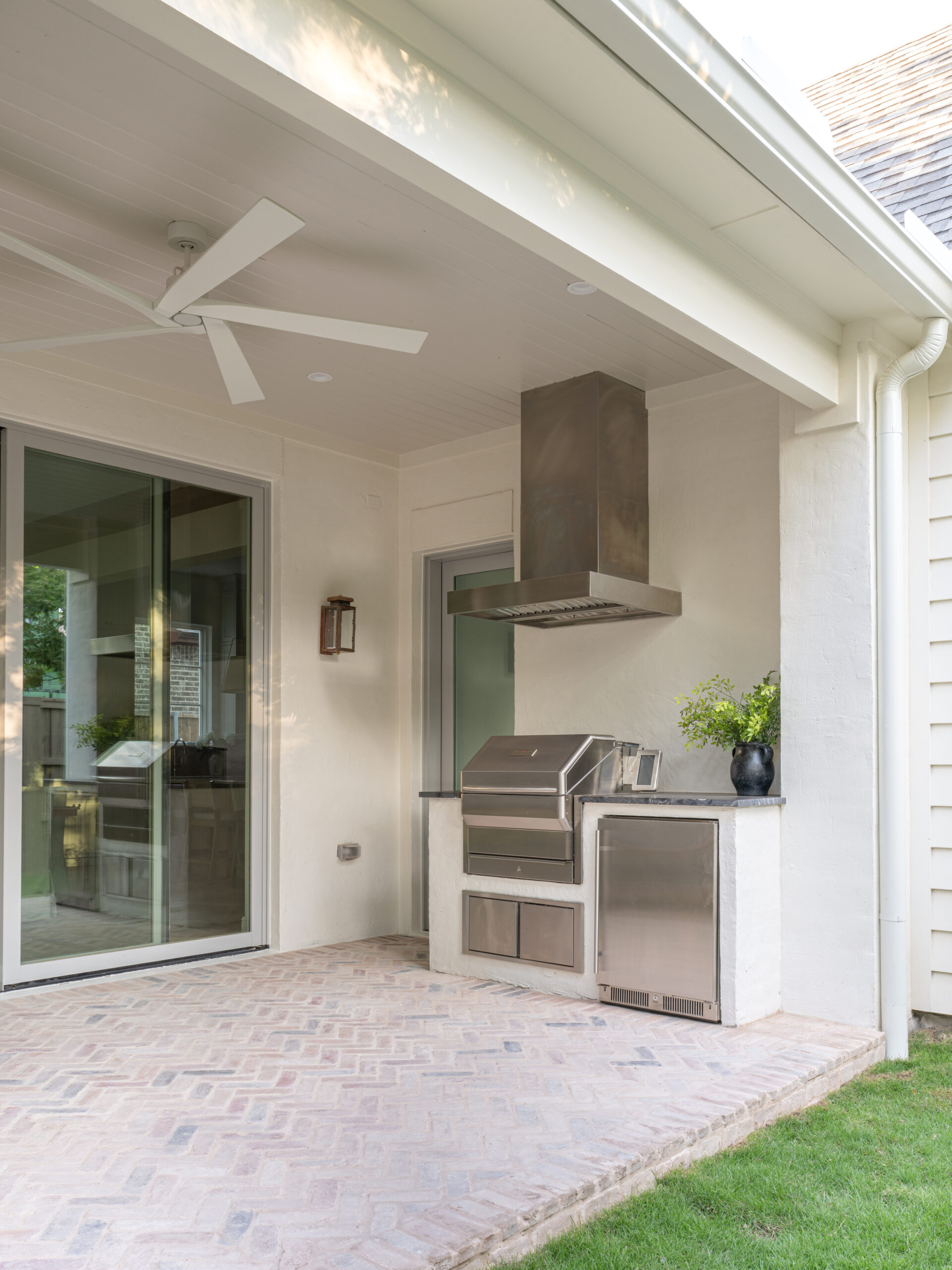 CLASSIC EUROPEAN REVIVAL – Chamberlain Arlington Heights, Lafayette Ave, Fort Worth, TX 76107-42 Outdoor kitchen with built-in grill and stainless hood — luxury custom remodel, Blue Cypress Design Build